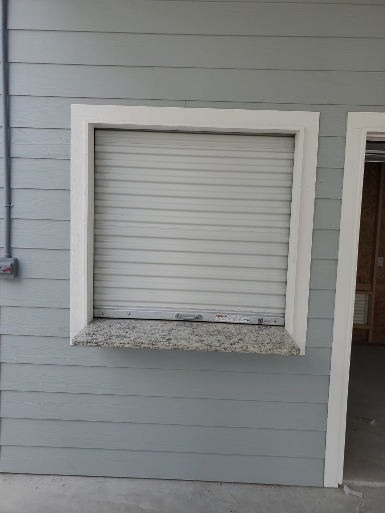 vendor window garage door
